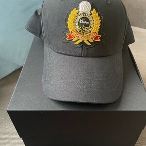 Bijan Black and Gold cap NWOT